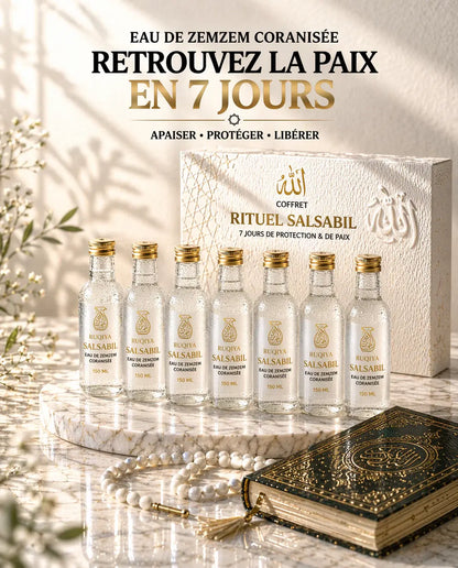 Coffret Rituel Salsabil premium composé de 7 flacons d'eau de Zamzam coranisée pour cure de roqya de sept jours, présenté avec un Coran noble et un chapelet perlé blanc sur socle en marbre luxueux.